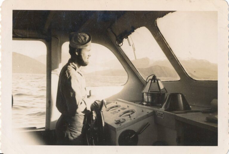F.G. Wilkes in smallboat, 1943